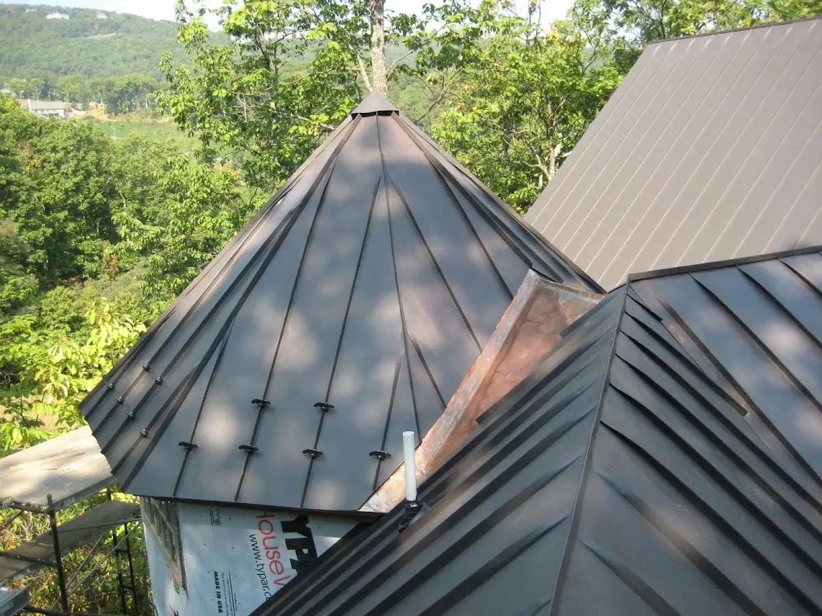 Professional Gutter Cleaning by Craftsman Roofing in Grand